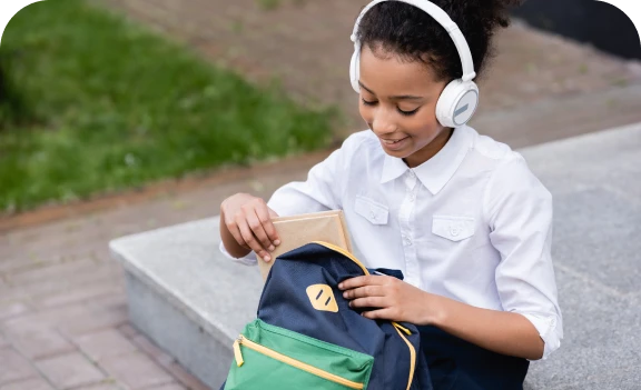 child with backpack